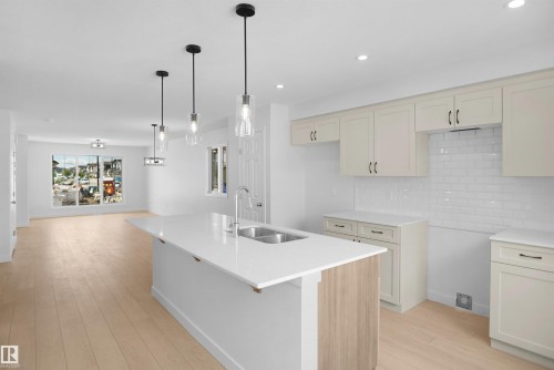 546 Ashgrove Circle, Leduc, AB - Indoor Photo Showing Kitchen With Double Sink With Upgraded Kitchen