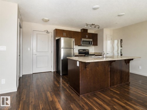 #325 5515 7 Av Sw, Edmonton, AB - Indoor Photo Showing Kitchen With Stainless Steel Kitchen