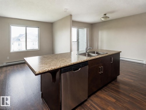 #325 5515 7 Av Sw, Edmonton, AB - Indoor Photo Showing Kitchen With Double Sink