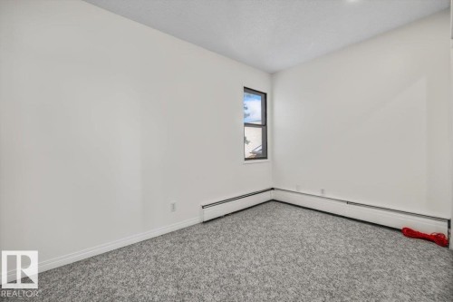 #206 10148 118 St Nw, Edmonton, AB - Indoor Photo Showing Other Room