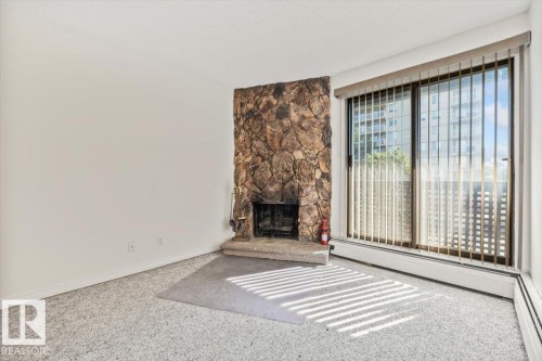 #206 10148 118 St Nw, Edmonton, AB - Indoor With Fireplace