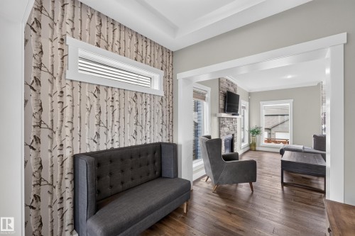 Entryway featuring a decorative accent wall and transom window - 1399 Graydon Hill Way Sw, Edmonton, AB - Indoor