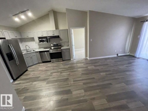 #405 151 Edwards Dr Sw, Edmonton, AB - Indoor Photo Showing Kitchen With Double Sink