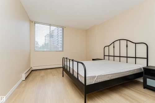#201 12141 Jasper Av Nw, Edmonton, AB - Indoor Photo Showing Bedroom