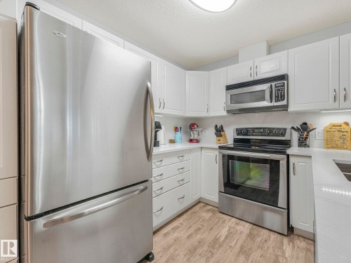 #208 16035 132 St Nw, Edmonton, AB - Indoor Photo Showing Kitchen With Stainless Steel Kitchen