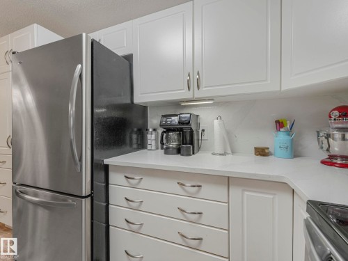#208 16035 132 St Nw, Edmonton, AB - Indoor Photo Showing Kitchen With Stainless Steel Kitchen
