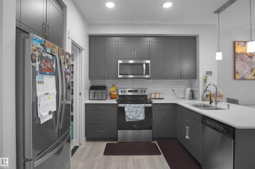 2551 12 Avenue Nw, Edmonton, AB - Indoor Photo Showing Kitchen With Double Sink With Upgraded Kitchen