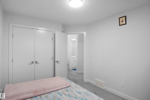 2551 12 Avenue Nw, Edmonton, AB - Indoor Photo Showing Bedroom