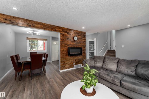 9012 Meadowlark Road Nw, Edmonton, AB - Indoor Photo Showing Living Room With Fireplace