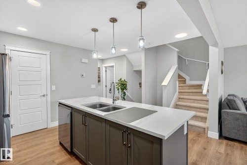 7820 Koruluk Link Link Sw, Edmonton, AB - Indoor Photo Showing Kitchen With Double Sink