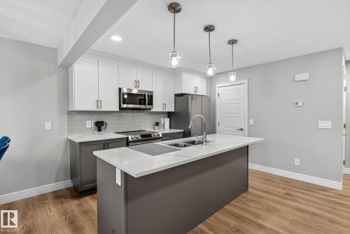 7820 Koruluk Link Link Sw, Edmonton, AB - Indoor Photo Showing Kitchen With Double Sink With Upgraded Kitchen