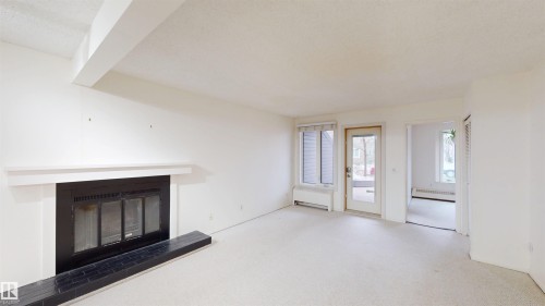 #109 11115 80 Av Nw, Edmonton, AB - Indoor With Fireplace