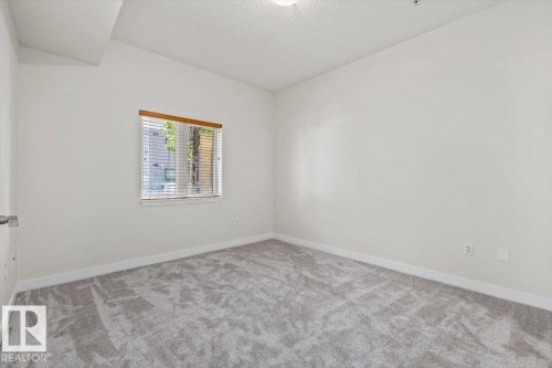 #118 10333 112 St Nw, Edmonton, AB - Indoor Photo Showing Other Room