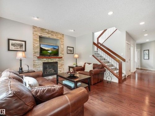 4609 60 Street, Beaumont, AB - Indoor Photo Showing Living Room With Fireplace