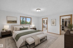Carpeted room with a ceiling-mounted light fixture - 