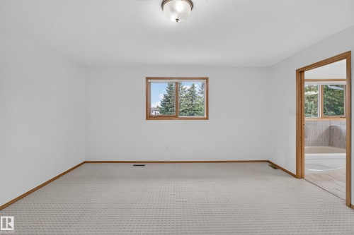 Recessed carpet flooring and white painted walls - 306 Twin Brooks Drive Nw, Edmonton, AB 