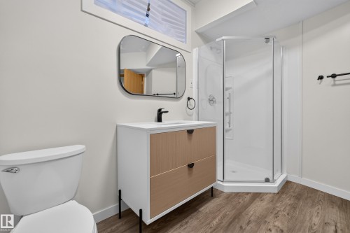 Modern vanity with a white countertop and black faucet - 306 Twin Brooks Drive Nw, Edmonton, AB 