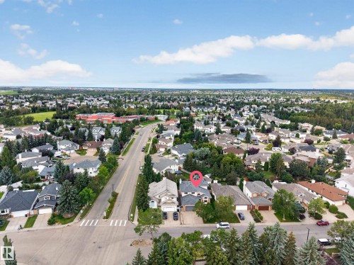 Residential neighborhood with mature trees and paved streets - 306 Twin Brooks Drive Nw, Edmonton, AB 