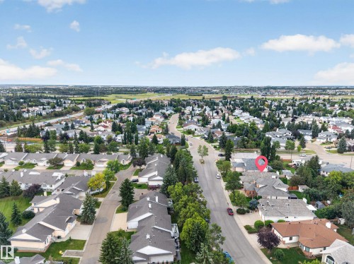 Residential neighborhood with tree-lined streets and varied architectural styles - 306 Twin Brooks Drive Nw, Edmonton, AB 