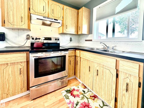 244 Porter Avenue, Millet, AB - Indoor Photo Showing Kitchen With Double Sink
