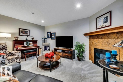 #19 50 Oakridge Dr S, St. Albert, AB - Indoor Photo Showing Living Room With Fireplace