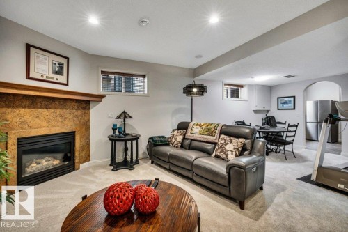 #19 50 Oakridge Dr S, St. Albert, AB - Indoor Photo Showing Living Room With Fireplace
