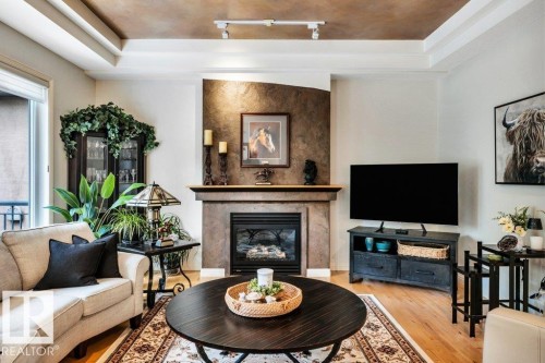 #19 50 Oakridge Dr S, St. Albert, AB - Indoor Photo Showing Living Room With Fireplace
