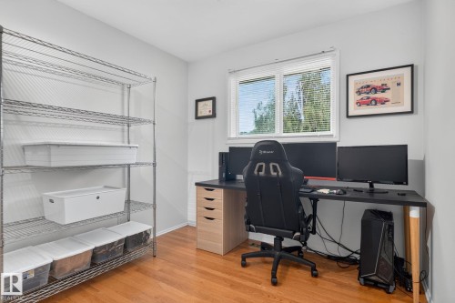 Hardwood-style flooring, white walls, and a large window with blinds - 12 Latimer Place, St. Albert, AB - Indoor Photo Showing Office