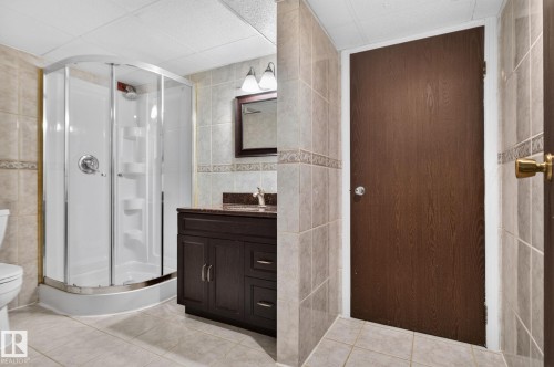 Enclosed shower with clear glass surround - 12 Latimer Place, St. Albert, AB - Indoor Photo Showing Bathroom