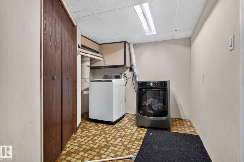Laundry room featuring washer and dryer as well as  the utility room off to the side. - 12 Latimer Place, St. Albert, AB - Indoor Photo Showing Laundry Room