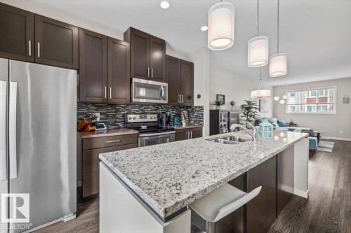#88 320 Secord Blvd Nw, Edmonton, AB - Indoor Photo Showing Kitchen With Stainless Steel Kitchen With Double Sink With Upgraded Kitchen