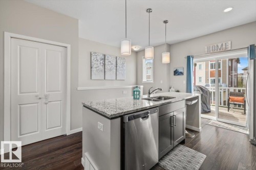 #88 320 Secord Blvd Nw, Edmonton, AB - Indoor Photo Showing Kitchen With Double Sink