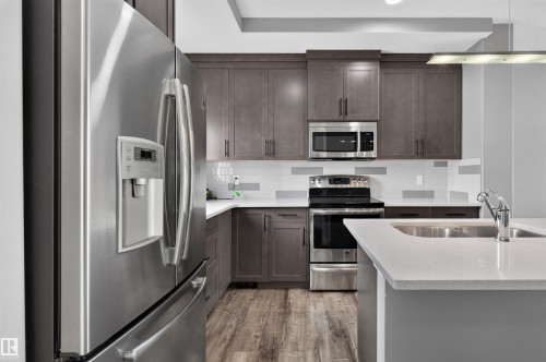 812 Morris Avenue, Leduc, AB - Indoor Photo Showing Kitchen With Double Sink With Upgraded Kitchen