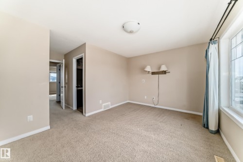 7706 Schmid Crescent Nw, Edmonton, AB - Indoor Photo Showing Other Room