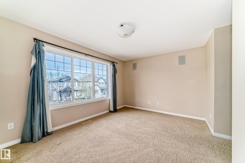 7706 Schmid Crescent Nw, Edmonton, AB - Indoor Photo Showing Other Room