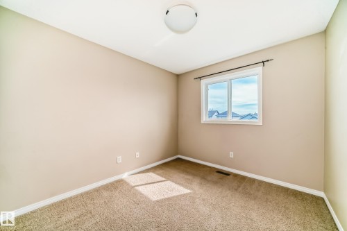 7706 Schmid Crescent Nw, Edmonton, AB - Indoor Photo Showing Other Room