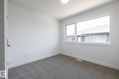 #32 7020 Keswick Cm Sw, Edmonton, AB - Indoor Photo Showing Other Room