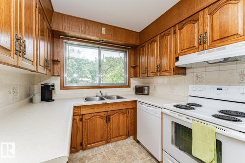 10726 70 Avenue Nw, Edmonton, AB - Indoor Photo Showing Kitchen With Double Sink