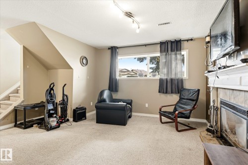 12435 46 Street Nw, Edmonton, AB - Indoor With Fireplace