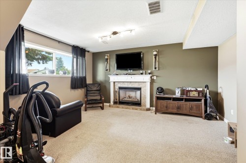 12435 46 Street Nw, Edmonton, AB - Indoor With Fireplace