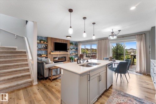 2 Caledon Crescent, Spruce Grove, AB - Indoor Photo Showing Kitchen With Fireplace With Double Sink