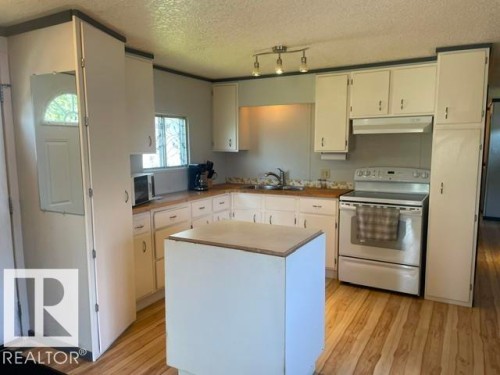 58 The Parkway Northwest, Edmonton, AB - Indoor Photo Showing Kitchen With Double Sink