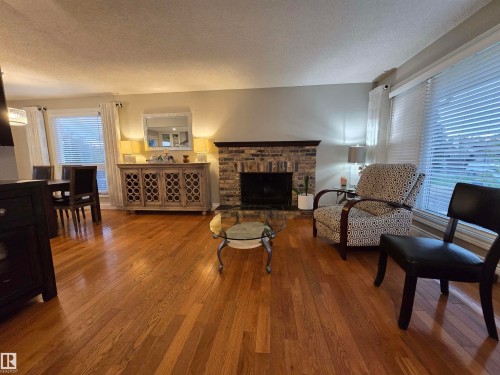 14603 122 Street Nw, Edmonton, AB - Indoor Photo Showing Living Room With Fireplace