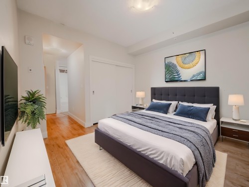 #304 11933 Jasper Av Nw, Edmonton, AB - Indoor Photo Showing Bedroom