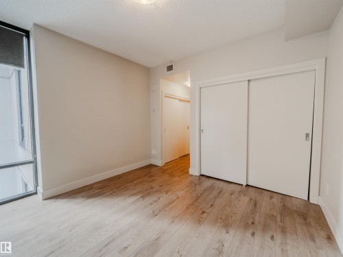 #304 11933 Jasper Av Nw, Edmonton, AB - Indoor Photo Showing Other Room