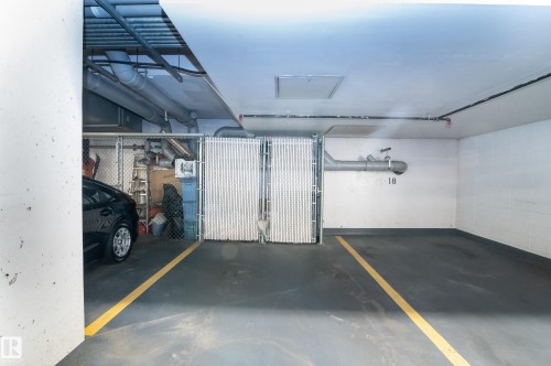#304 11933 Jasper Av Nw, Edmonton, AB - Indoor Photo Showing Garage