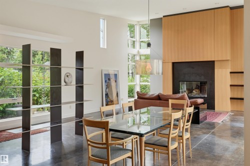 9758 86 Avenue Nw, Edmonton, AB - Indoor Photo Showing Dining Room With Fireplace