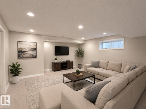 Staged with AI - Recessed lighting, light-toned carpeting, a window with white trim, and light-colored walls - 192 Keyport Circle, Leduc, AB - Indoor
