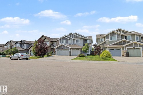 Contemporary multi-story residential building with a multi-tone facade - 17304 73 Street Nw, Edmonton, AB - Outdoor With Facade