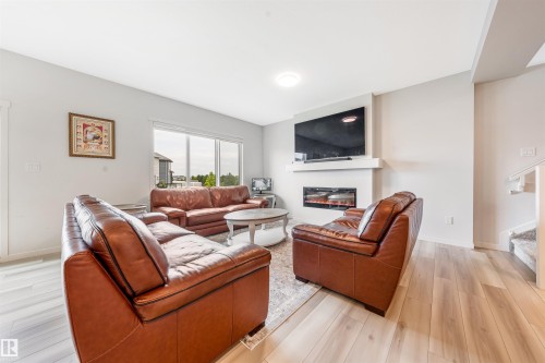 17072 45 Street Nw, Edmonton, AB - Indoor Photo Showing Living Room With Fireplace